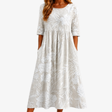 Elegancka Midi Sukienka z Kieszeniami Ogród Szeptów