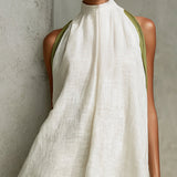 Agathe | Mini Trapeze Dress in White and Olive Green Floral Print