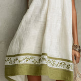 Agathe | Mini Trapeze Dress in White and Olive Green Floral Print